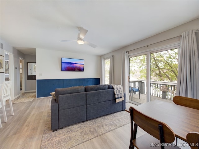 24930 Leona Ln, Versailles, MO 65084 - living room with light wood finished floors and a ceiling fan