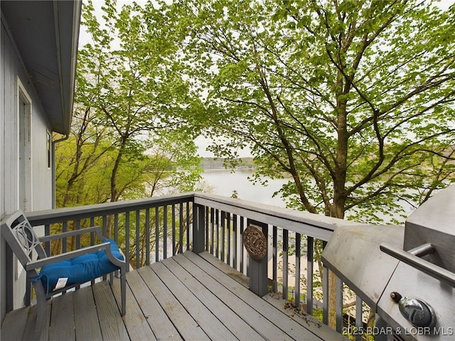 24930 Leona Ln, Versailles, MO 65084 - wooden terrace with a water view