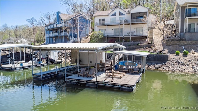 6605 Saint Moritz Dr, Osage Beach, MO 65065 - view of dock featuring stairs, a water view, and boat lift