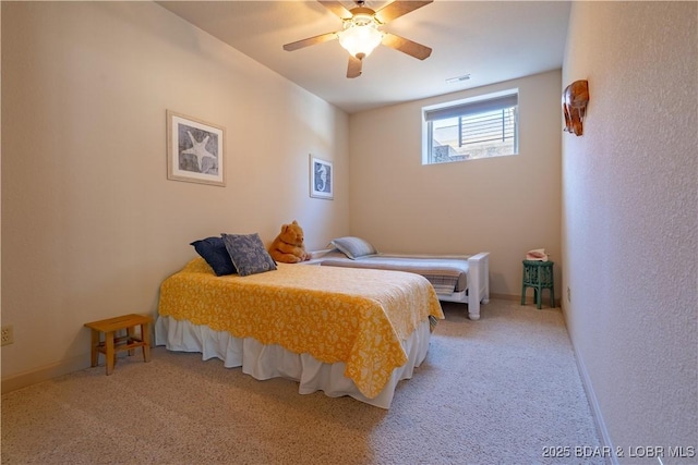 6605 Saint Moritz Dr, Osage Beach, MO 65065 - bedroom with visible vents, carpet flooring, and ceiling fan
