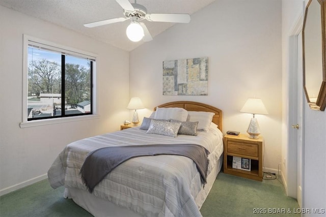 carpeted bedroom featuring vaulted ceiling, baseboards, and ceiling fan