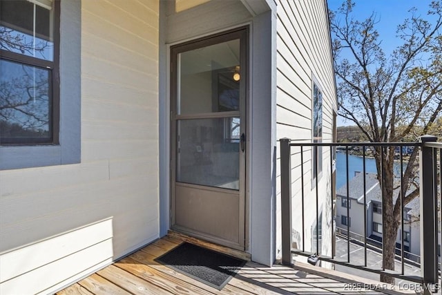 entrance to property with a balcony