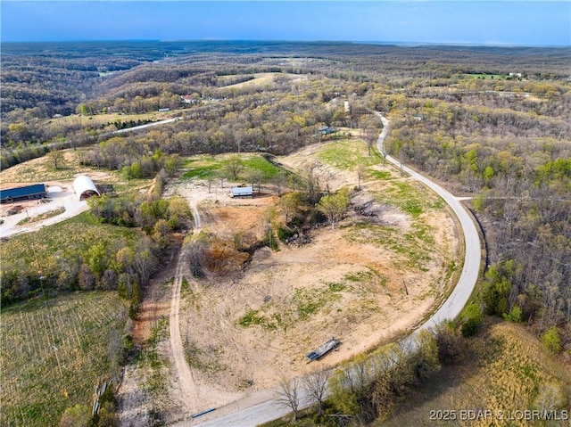 3053 Doc Ridgeway Dr, Roach, MO 65787 - aerial view of a heavily wooded area