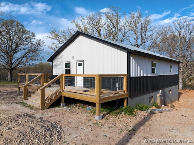 3053 Doc Ridgeway Dr, Roach, MO 65787 - view of side of home featuring a wooden deck