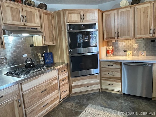 31945 Idle Wild Rd, Gravois Mills, MO 65037 - kitchen featuring under cabinet range hood, light brown cabinetry, appliances with stainless steel finishes, and tasteful backsplash