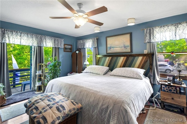 31945 Idle Wild Rd, Gravois Mills, MO 65037 - bedroom with access to outside and a ceiling fan