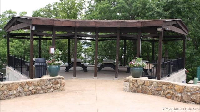 view of property's community featuring a gazebo and a patio