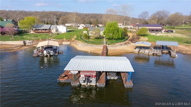 view of dock featuring a water view and boat lift