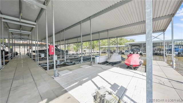 75 Cedar Heights Ln Unit 4D, Camdenton, MO 65020 - dock with a water view and boat lift