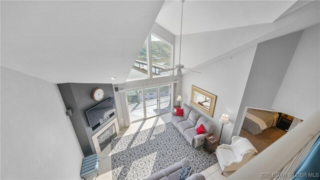 75 Cedar Heights Ln Unit 4D, Camdenton, MO 65020 - tiled living room featuring high vaulted ceiling and ceiling fan
