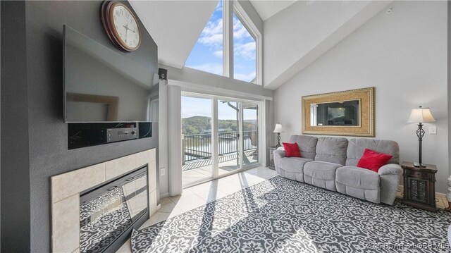 75 Cedar Heights Ln Unit 4D, Camdenton, MO 65020 - tiled living room with a tile fireplace and high vaulted ceiling