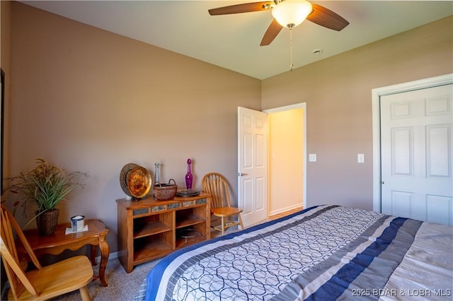 bedroom featuring carpet flooring, a ceiling fan, and baseboards