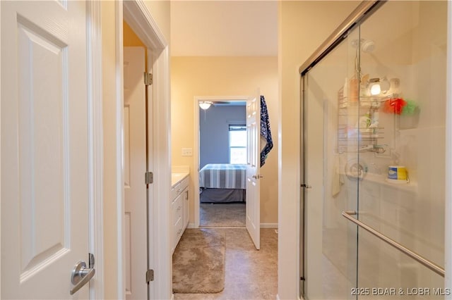 full bathroom with a stall shower and ensuite bathroom