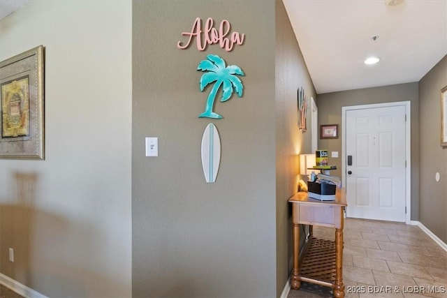 4800 Eagleview Dr Unit 133, Osage Beach, MO 65065 - tiled entryway featuring baseboards