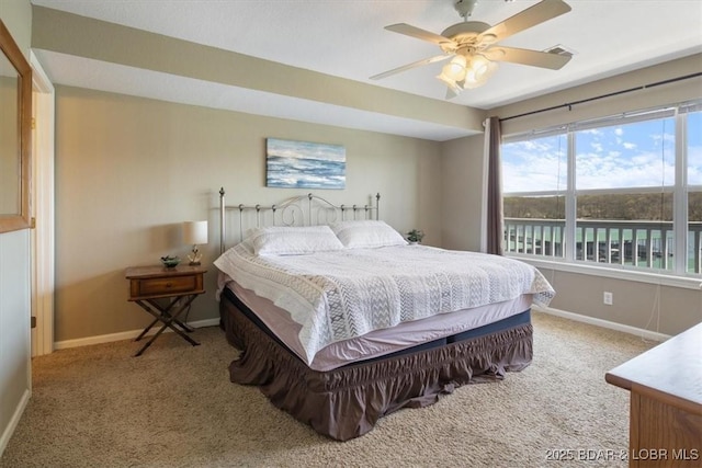 4800 Eagleview Dr Unit 133, Osage Beach, MO 65065 - bedroom with carpet floors, baseboards, and a ceiling fan