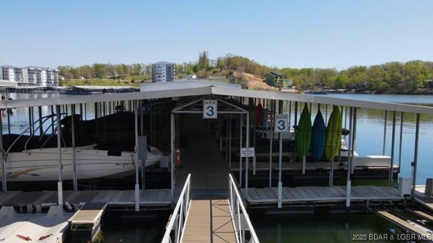 138 Falls Dr Unit 2B, Lake Ozark, MO 65049 - dock area featuring a water view