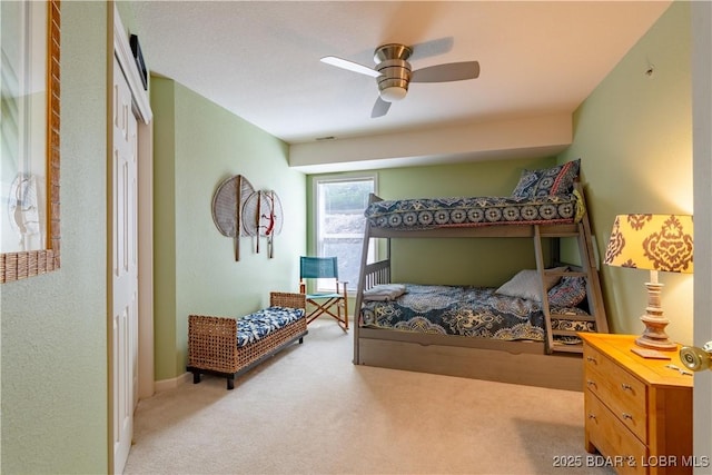 245 Bristol Bay Dr Unit 2B, Lake Ozark, MO 65049 - bedroom with light carpet and a ceiling fan