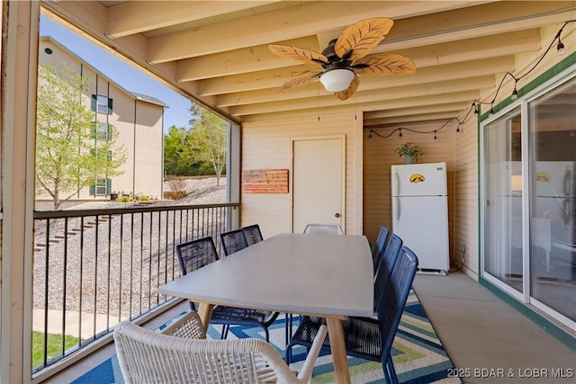 245 Bristol Bay Dr Unit 2B, Lake Ozark, MO 65049 - sunroom / solarium with ceiling fan, outdoor dining area, and beamed ceiling