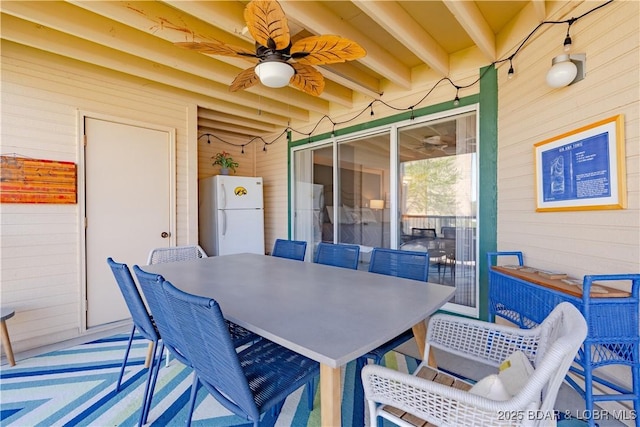 245 Bristol Bay Dr Unit 2B, Lake Ozark, MO 65049 - view of patio featuring a ceiling fan and outdoor dining space