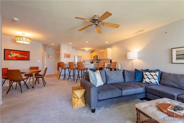 245 Bristol Bay Dr Unit 2B, Lake Ozark, MO 65049 - living area featuring light colored carpet, ceiling fan, and recessed lighting