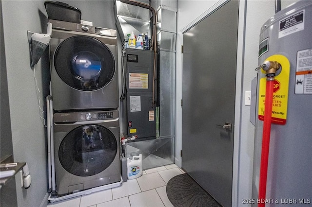284 Bloomington Dr, Lake Ozark, MO 65049 - washroom featuring stacked washing machine and dryer and tile patterned flooring