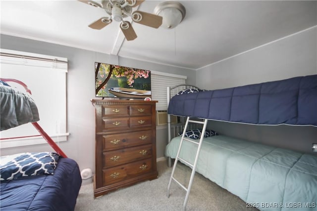 carpeted bedroom with a ceiling fan