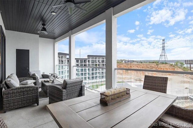1065 Topsider Ln Unit 508, Osage Beach, MO 65065 - view of patio with outdoor lounge area, a ceiling fan, and a balcony