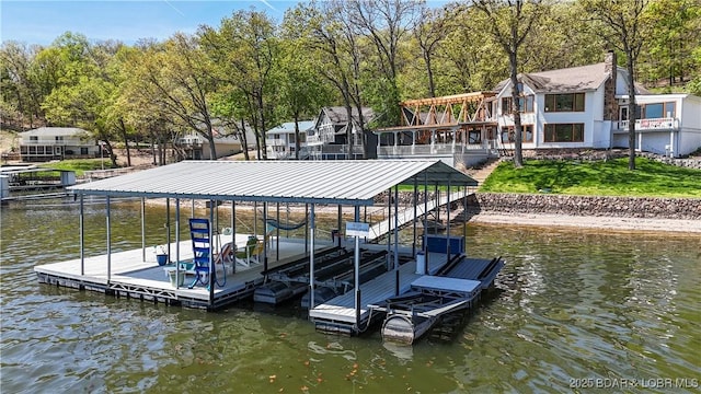 342 Porter Mill Springs Dr, Sunrise Beach, MO 65079 - dock area featuring boat lift, a water view, and a yard