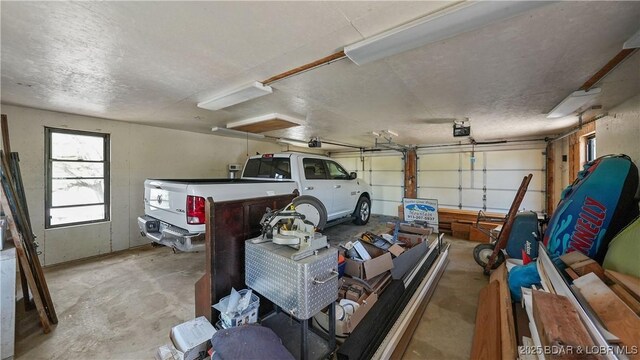 342 Porter Mill Springs Dr, Sunrise Beach, MO 65079 - garage with a garage door opener