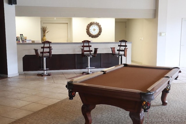 playroom with a dry bar and pool table