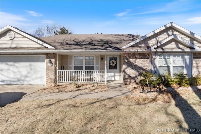 ranch-style house with a porch, an attached garage, brick siding, driveway, and a shingled roof