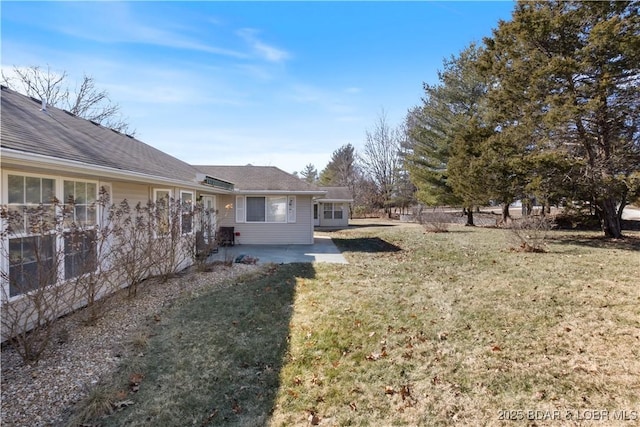3796 Meadow Ln, Osage Beach, MO 65065 - view of grassy yard with a patio area