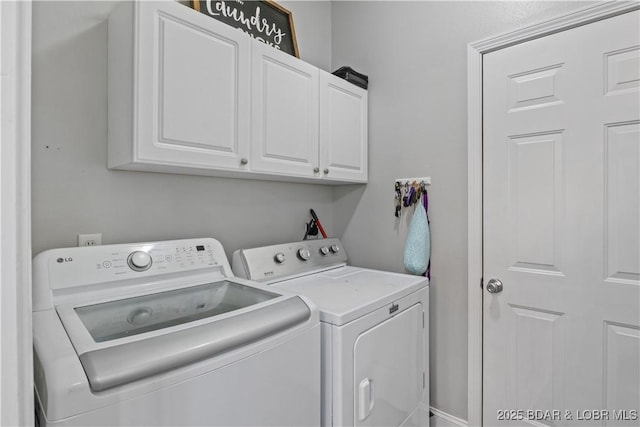 63 Lancelot Ct, Camdenton, MO 65020 - laundry room featuring cabinet space and washer and clothes dryer