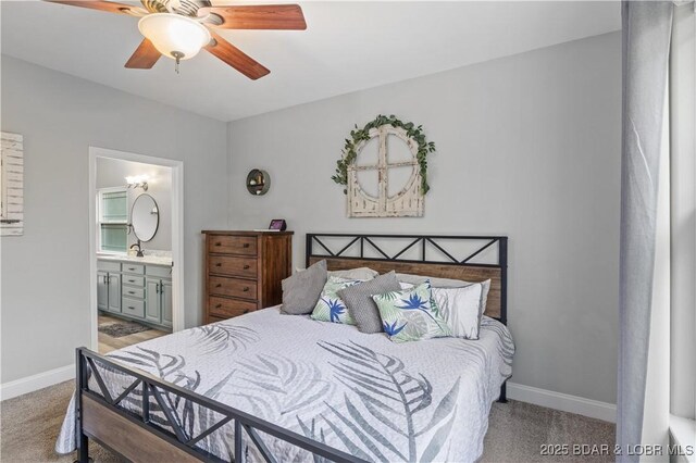 bedroom featuring ceiling fan, baseboards, ensuite bath, and carpet floors