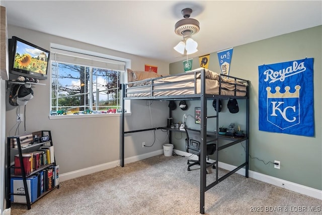 bedroom featuring carpet flooring and baseboards