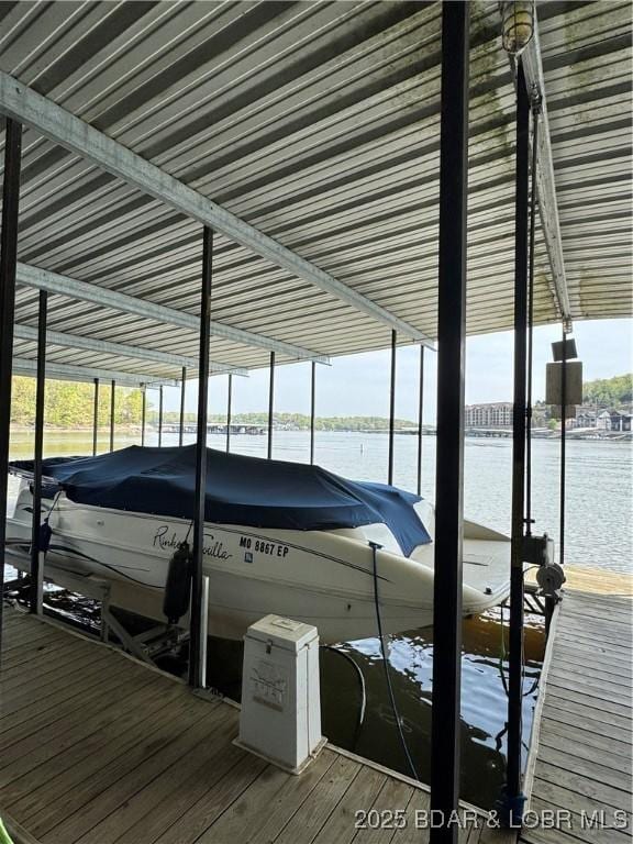 63 Lancelot Ct, Camdenton, MO 65020 - dock area with boat lift and a water view