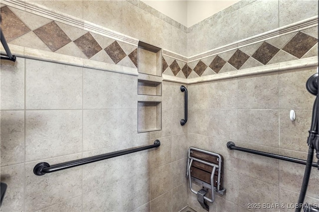 bathroom with a shower stall