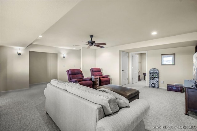living room with baseboards, recessed lighting, light carpet, and ceiling fan