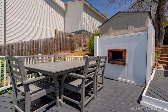4956 Shorewood Dr, Osage Beach, MO 65065 - deck with outdoor dining area and fence