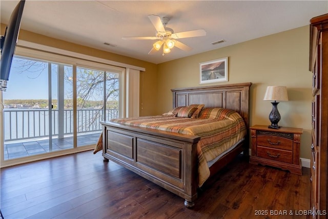 4956 Shorewood Dr, Osage Beach, MO 65065 - bedroom featuring visible vents, access to exterior, a ceiling fan, and dark wood-type flooring