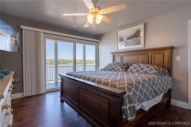 4956 Shorewood Dr, Osage Beach, MO 65065 - bedroom with visible vents, dark wood-style floors, access to outside, and baseboards