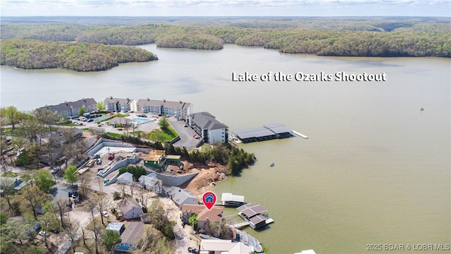 4956 Shorewood Dr, Osage Beach, MO 65065 - aerial view featuring a water view and a forest view