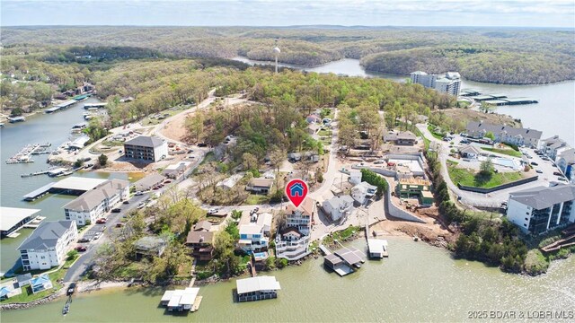 4956 Shorewood Dr, Osage Beach, MO 65065 - aerial view with a water view and a view of trees