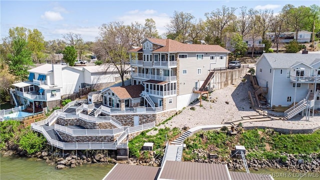 4956 Shorewood Dr, Osage Beach, MO 65065 - birds eye view of property with a water view and a residential view