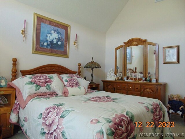 1932 Mimosa Ct, Lebanon, MO 65536 - bedroom featuring lofted ceiling
