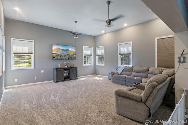 carpeted living room with recessed lighting, a ceiling fan, and baseboards