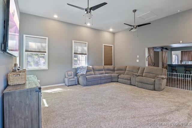 living area with carpet, ceiling fan, recessed lighting, and baseboards
