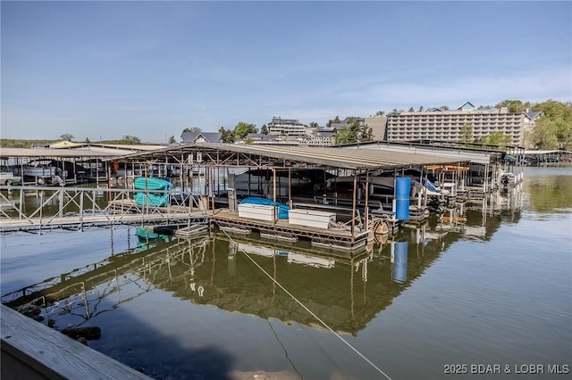 6570 Pelican Dr Unit 404, Osage Beach, MO 65065 - dock featuring a water view and boat lift