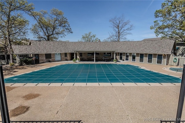 6570 Pelican Dr Unit 404, Osage Beach, MO 65065 - community pool featuring a patio area