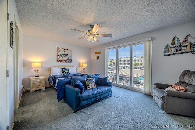 6570 Pelican Dr Unit 404, Osage Beach, MO 65065 - carpeted bedroom with access to outside, a textured ceiling, and ceiling fan
